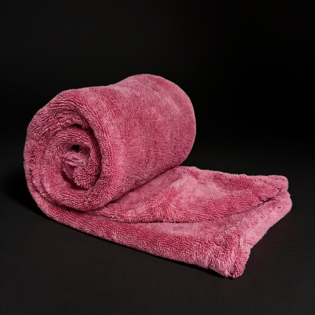 pink drying towel rolled