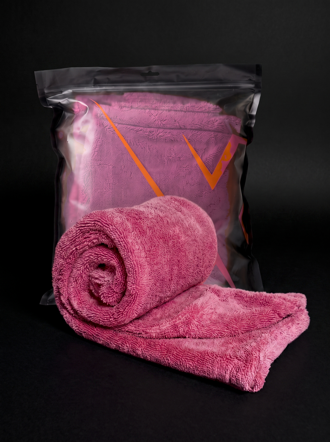 pink drying towel bag and towel